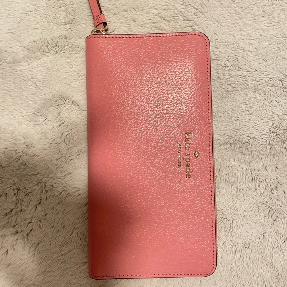 KATE SPADE PINK MULTI-POCKET WALLET.